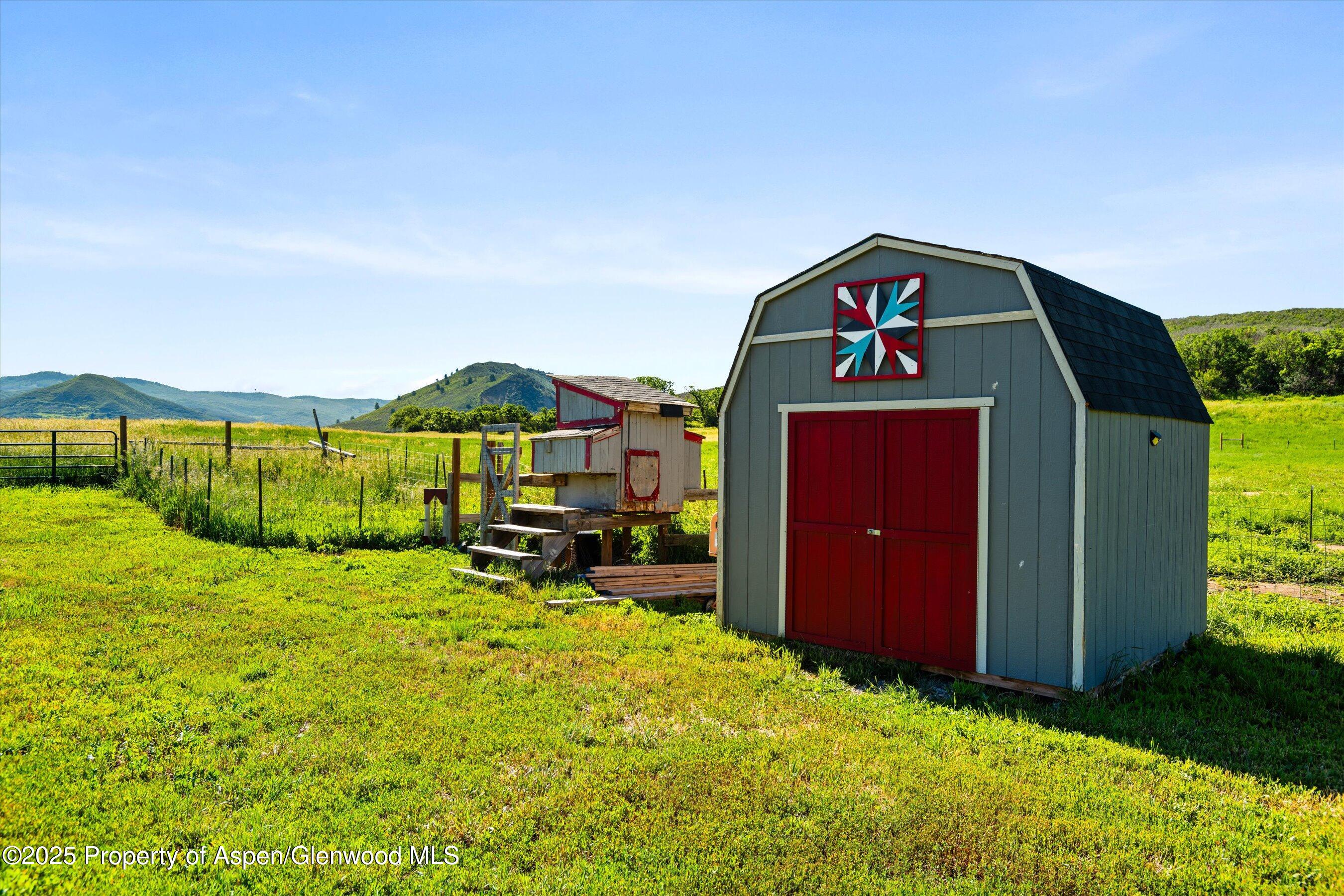 7315 County Road 312 New Castle, CO 81647 - Photo 66 of 75 a view of a house with a yard