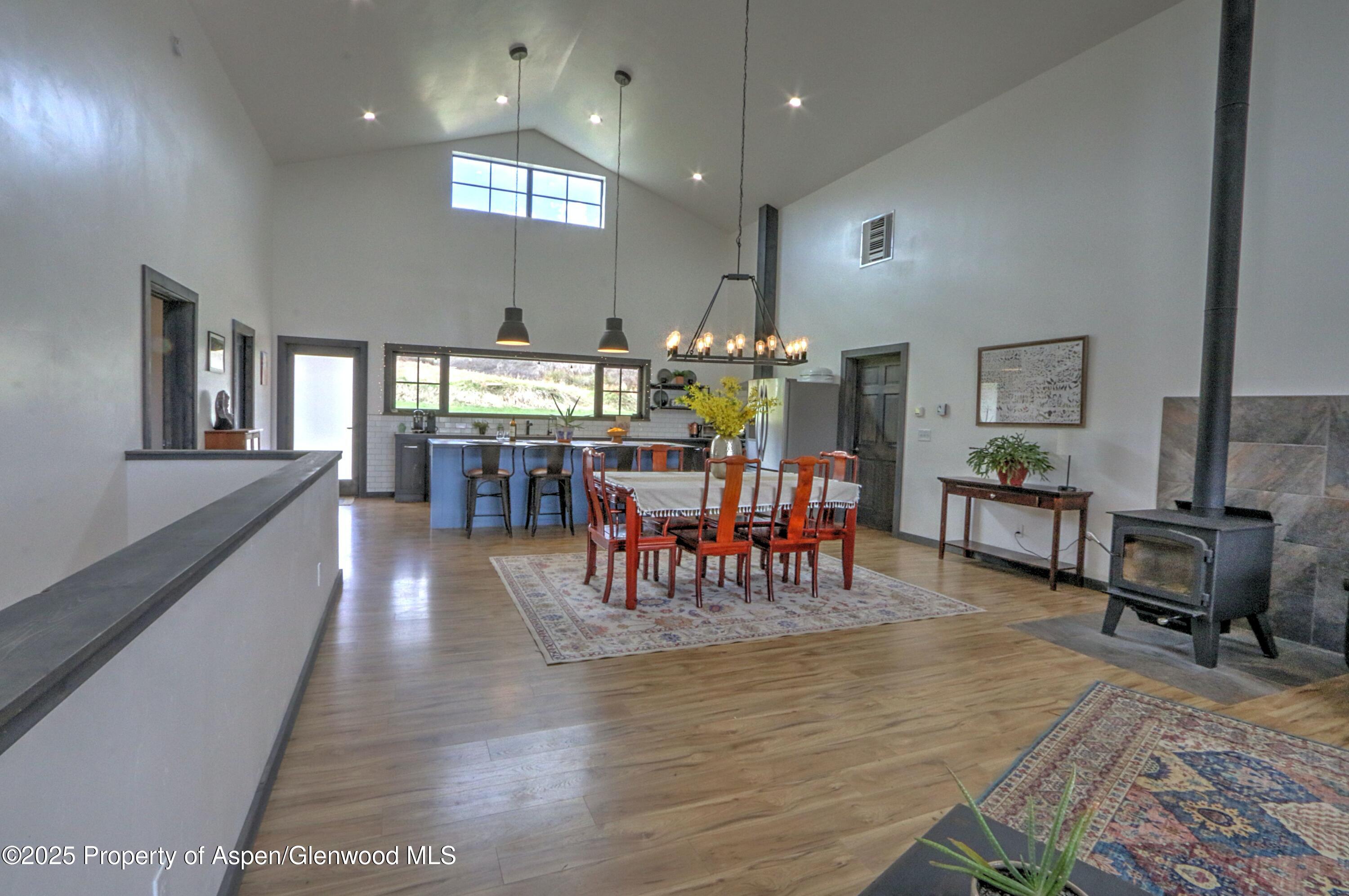 7315 County Road 312 New Castle, CO 81647 - Photo 8 of 75 a view of a dining room with furniture window and wooden floor