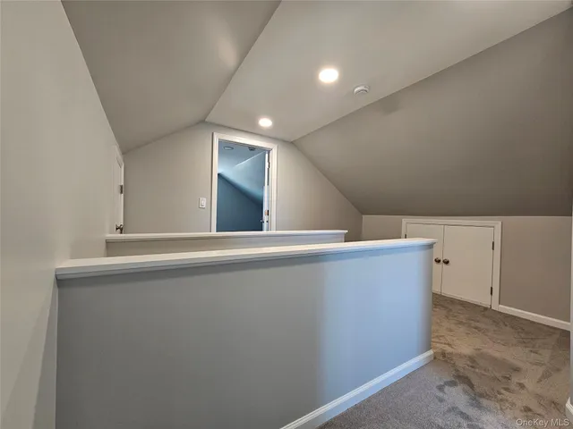 an empty room with windows and windows