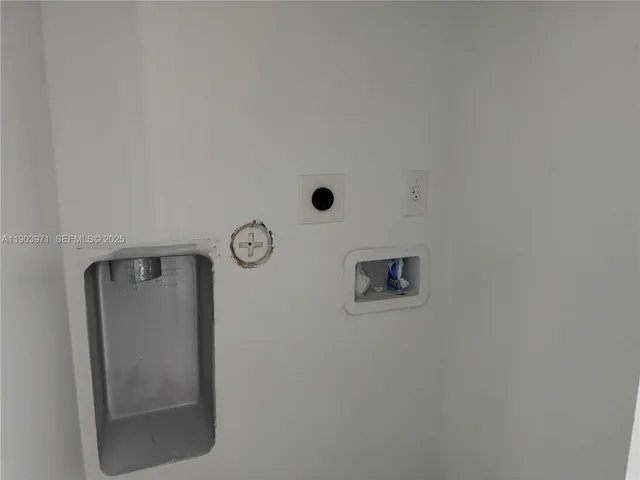 a picture of a wall with a door and a mirror