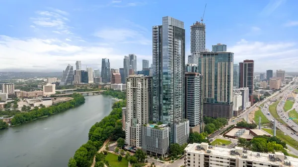 a view of a city with tall buildings