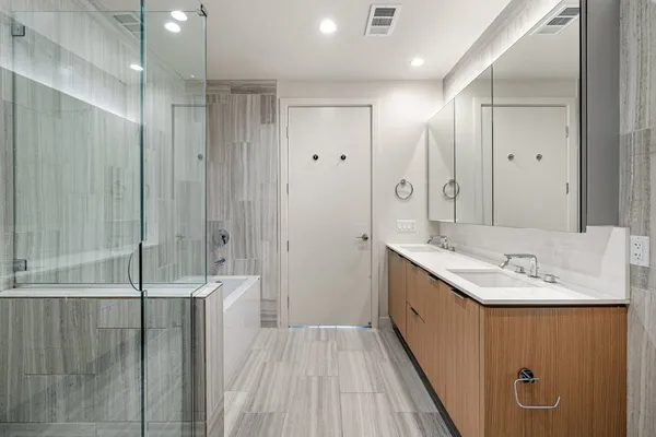 a view of an entryway with wooden floor