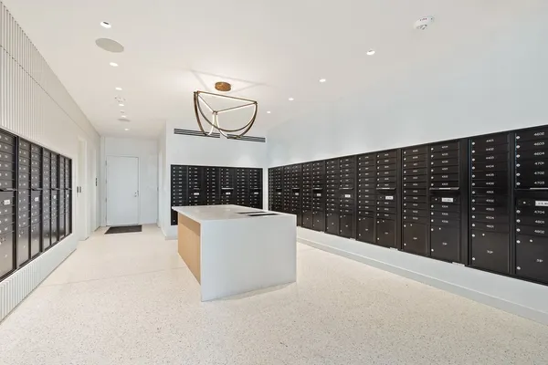 a view of a balcony with lake view and living space