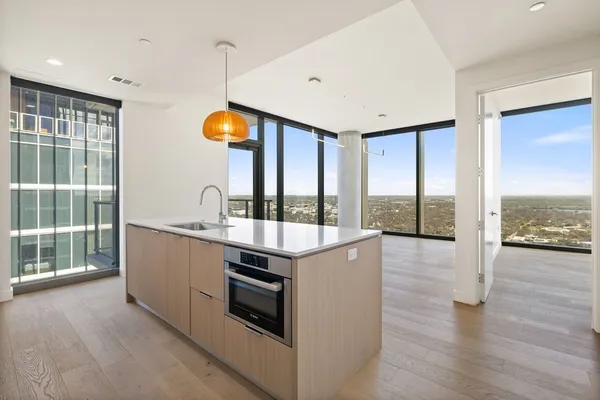 a view of the patio with couches and table and chairs