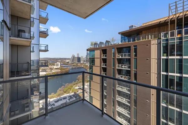 a picture of a bench in front of a wall