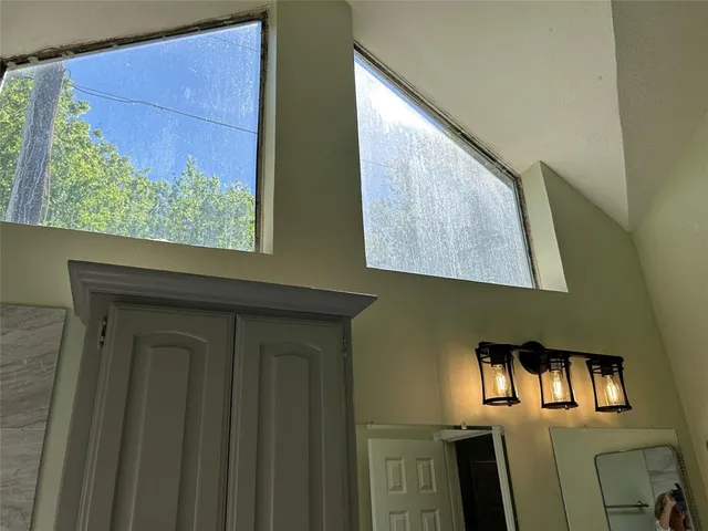 a view of a hallway with entryway