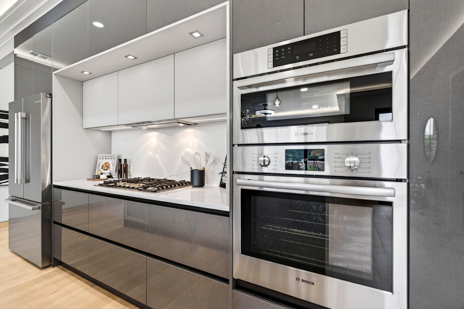 2024 West Irving Park Road, Unit 302 Chicago, IL 60618 - Photo 9 of 32 a kitchen with stainless steel appliances granite countertop a stove and a microwave