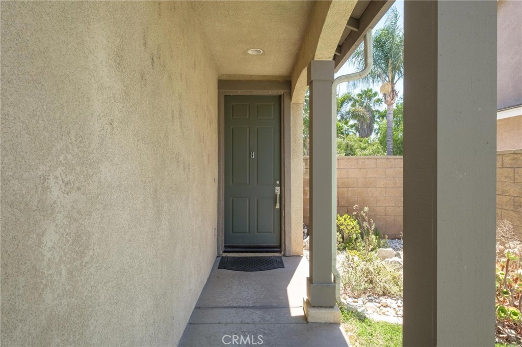 7940 Shadow Trails Lane Jurupa Valley, CA 92509 - Photo 32 of 34 a view of a door and wooden floor