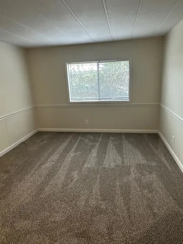 a view of a back yard of the house