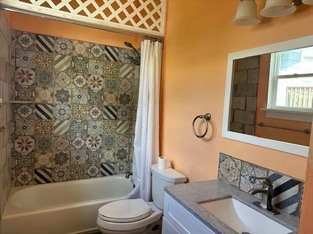 a dining room with furniture a window and wooden floor