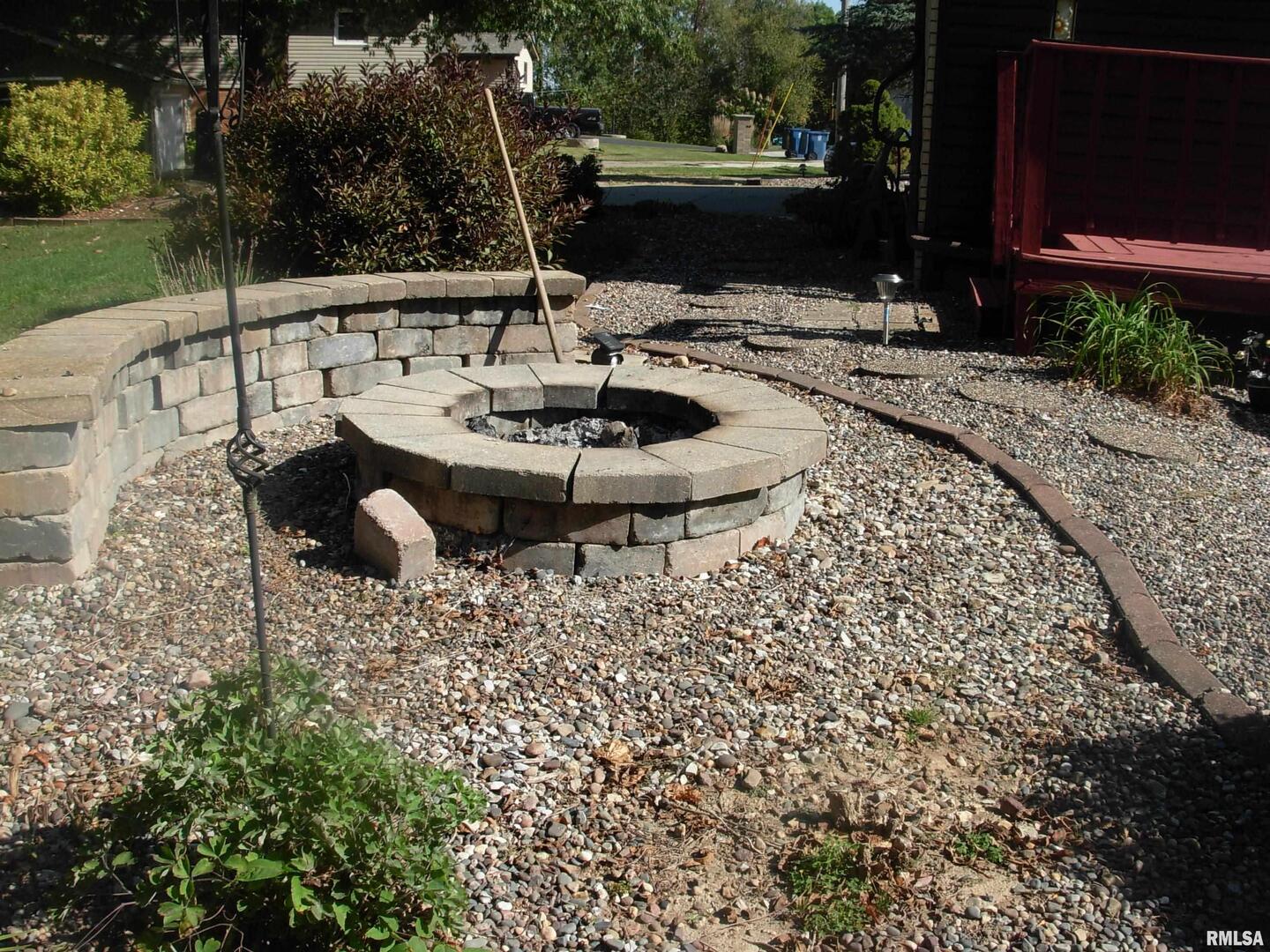 108 Andrea Court Cleveland, IL 61241 - Photo 12 of 32 a view of a backyard with sitting area