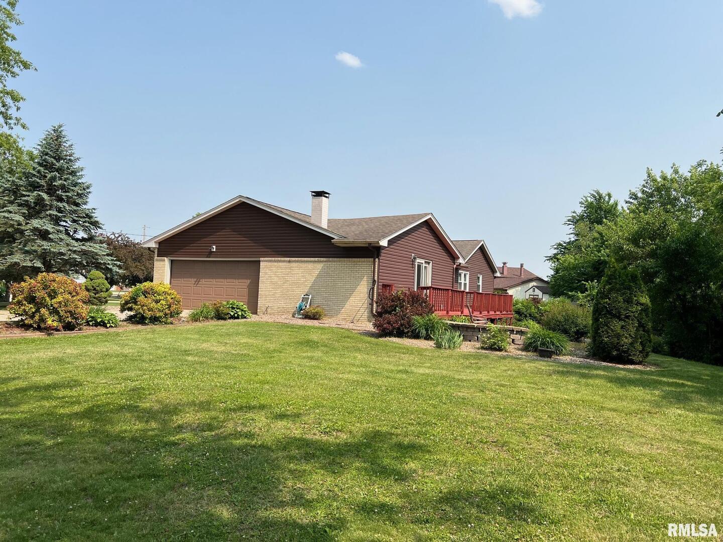 108 Andrea Court Cleveland, IL 61241 - Photo 2 of 32 a house view with a outdoor space