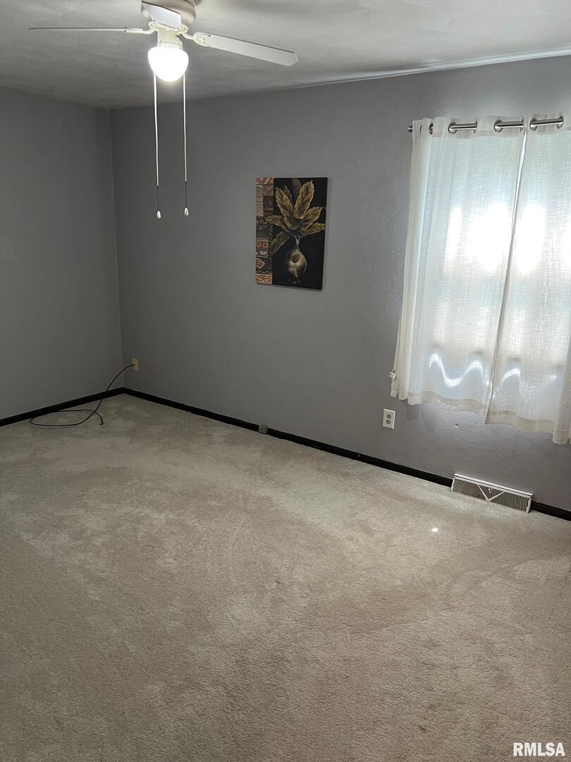 108 Andrea Court Cleveland, IL 61241 - Photo 24 of 32 a view of an empty room