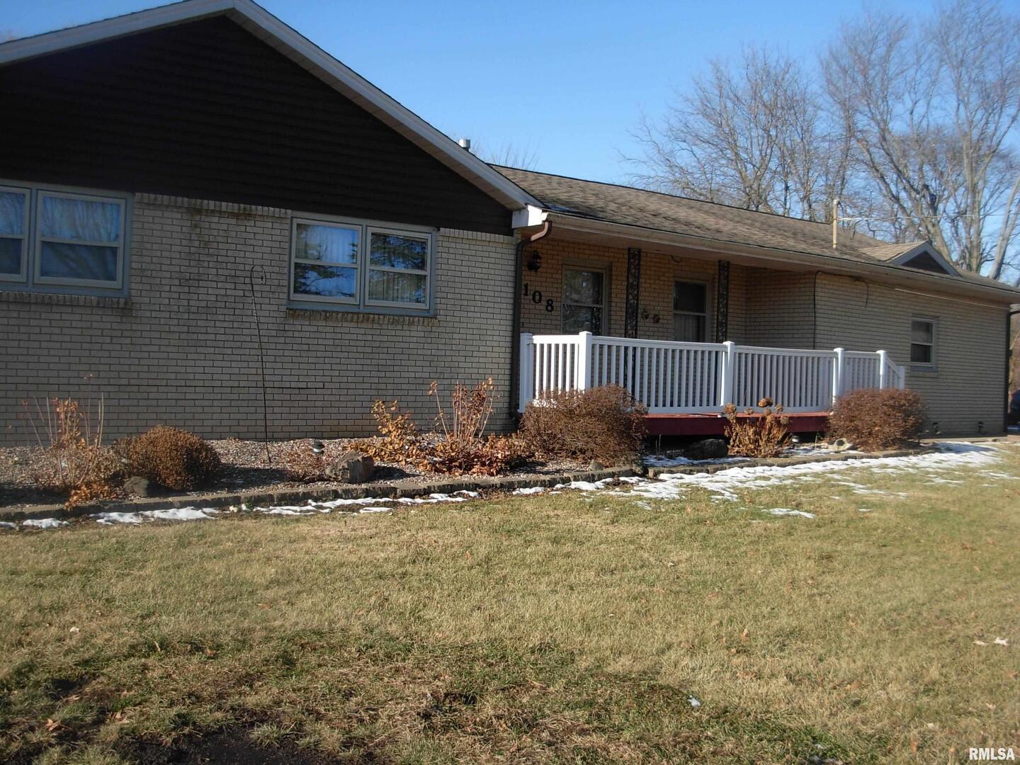108 Andrea Court Cleveland, IL 61241 - Photo 5 of 32 a front view of a house with a yard