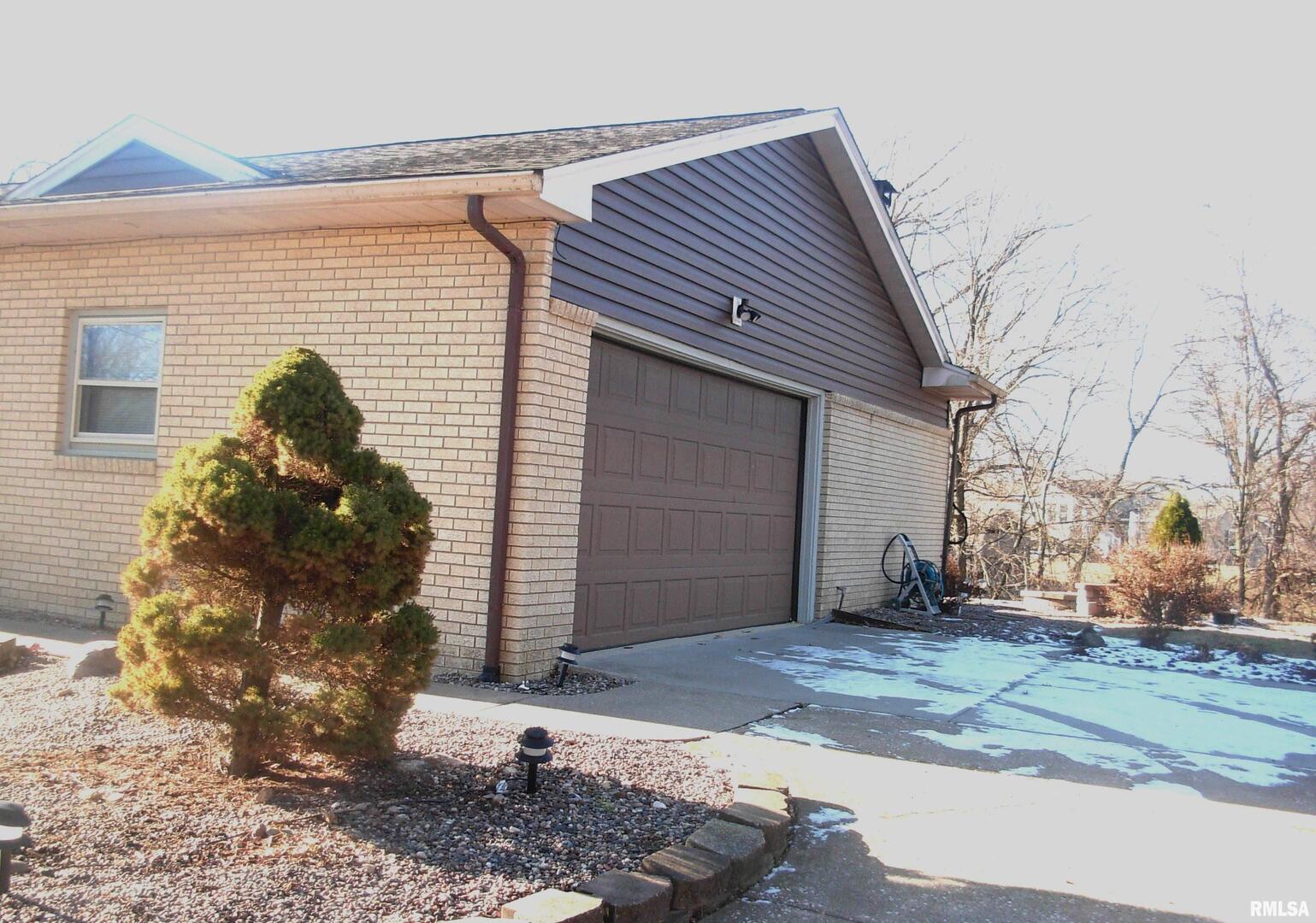 108 Andrea Court Cleveland, IL 61241 - Photo 7 of 32 a view of a house with a yard