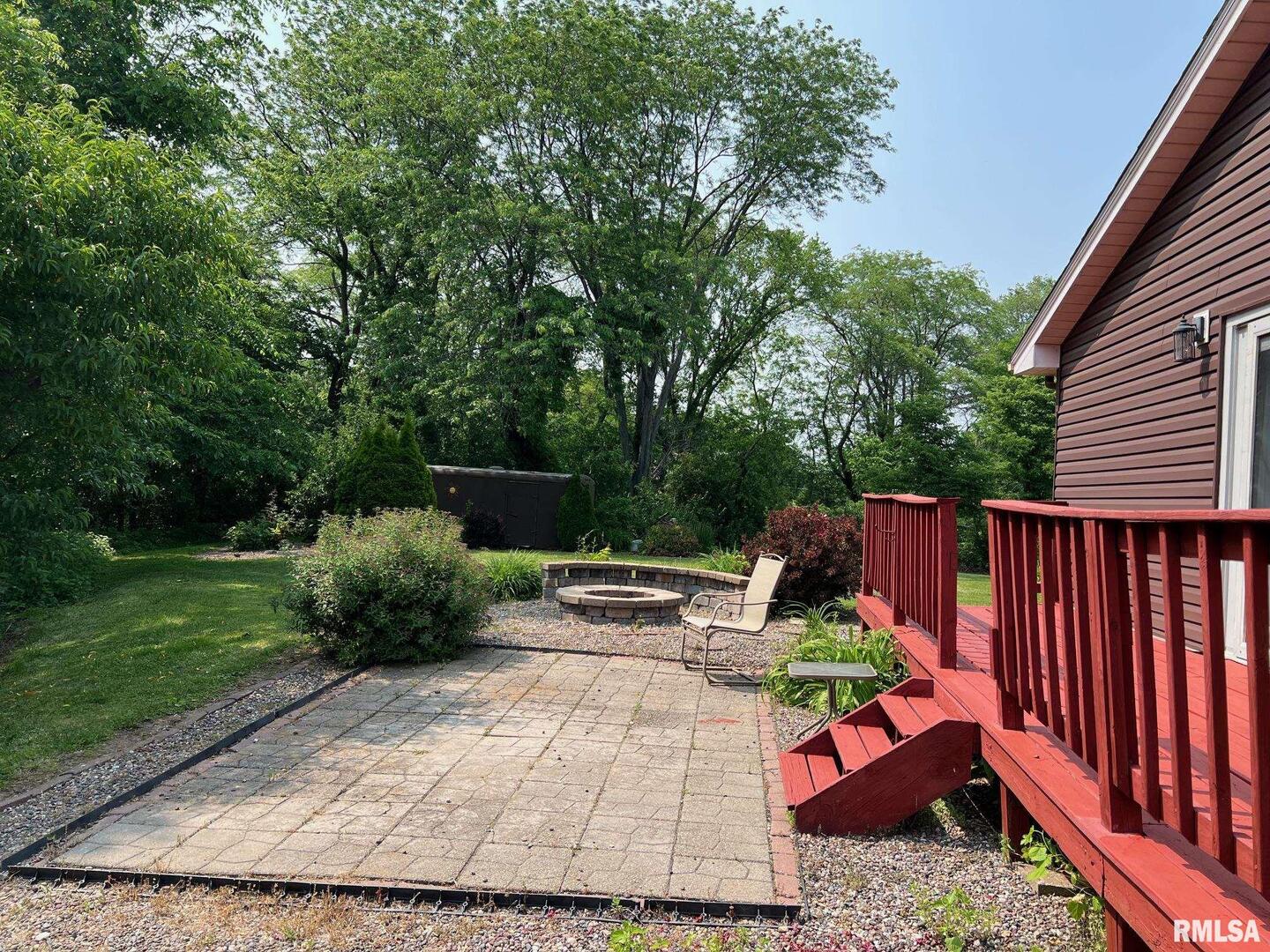 108 Andrea Court Cleveland, IL 61241 - Photo 8 of 32 a view of a backyard with sitting area