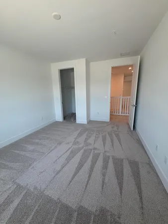 a view of hallway with stairs