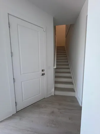 a view of entryway with stairs