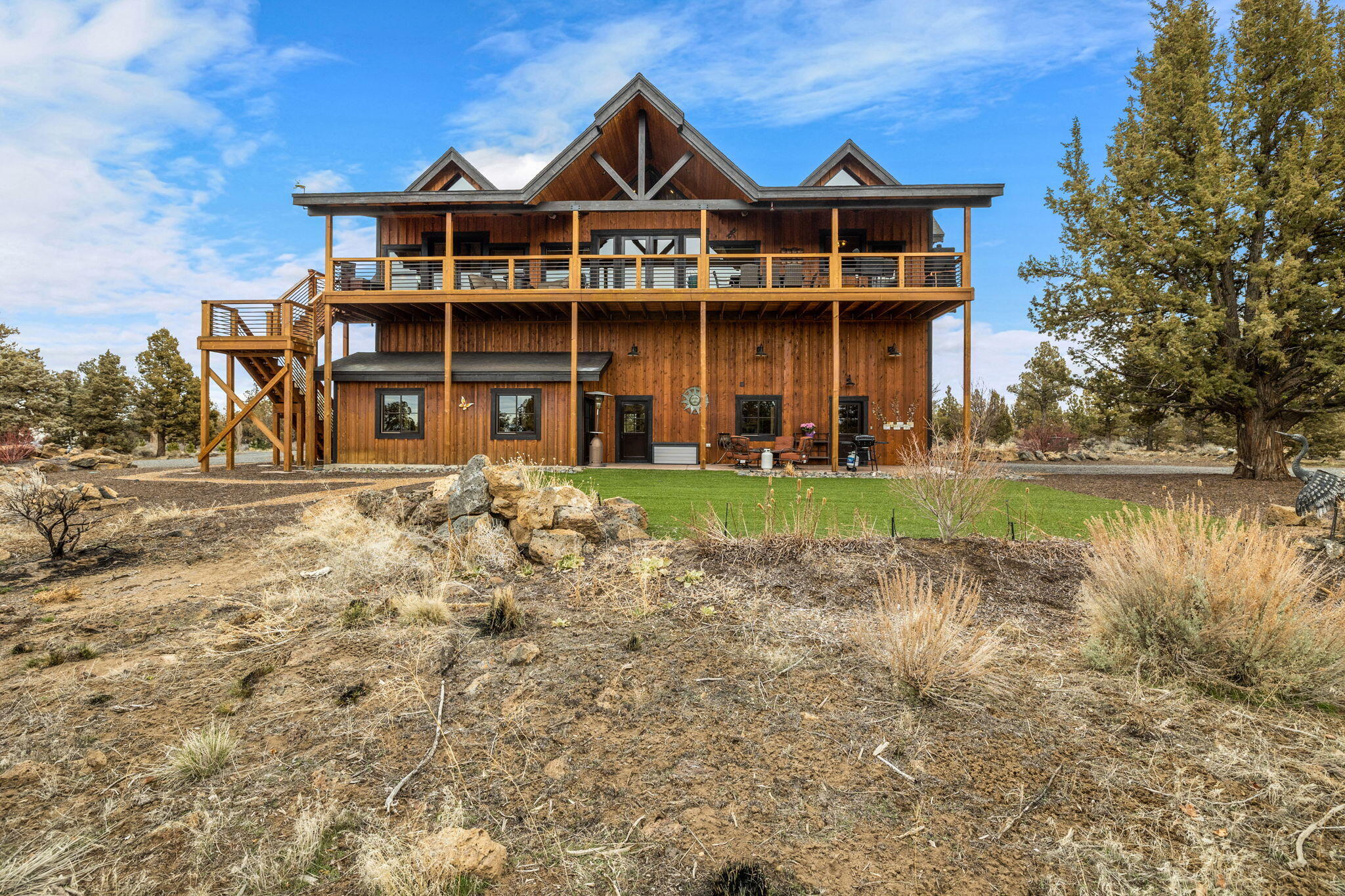 23150 Rickard Road Bend, OR 97702 - Photo 41 of 60 a front view of a house with a yard
