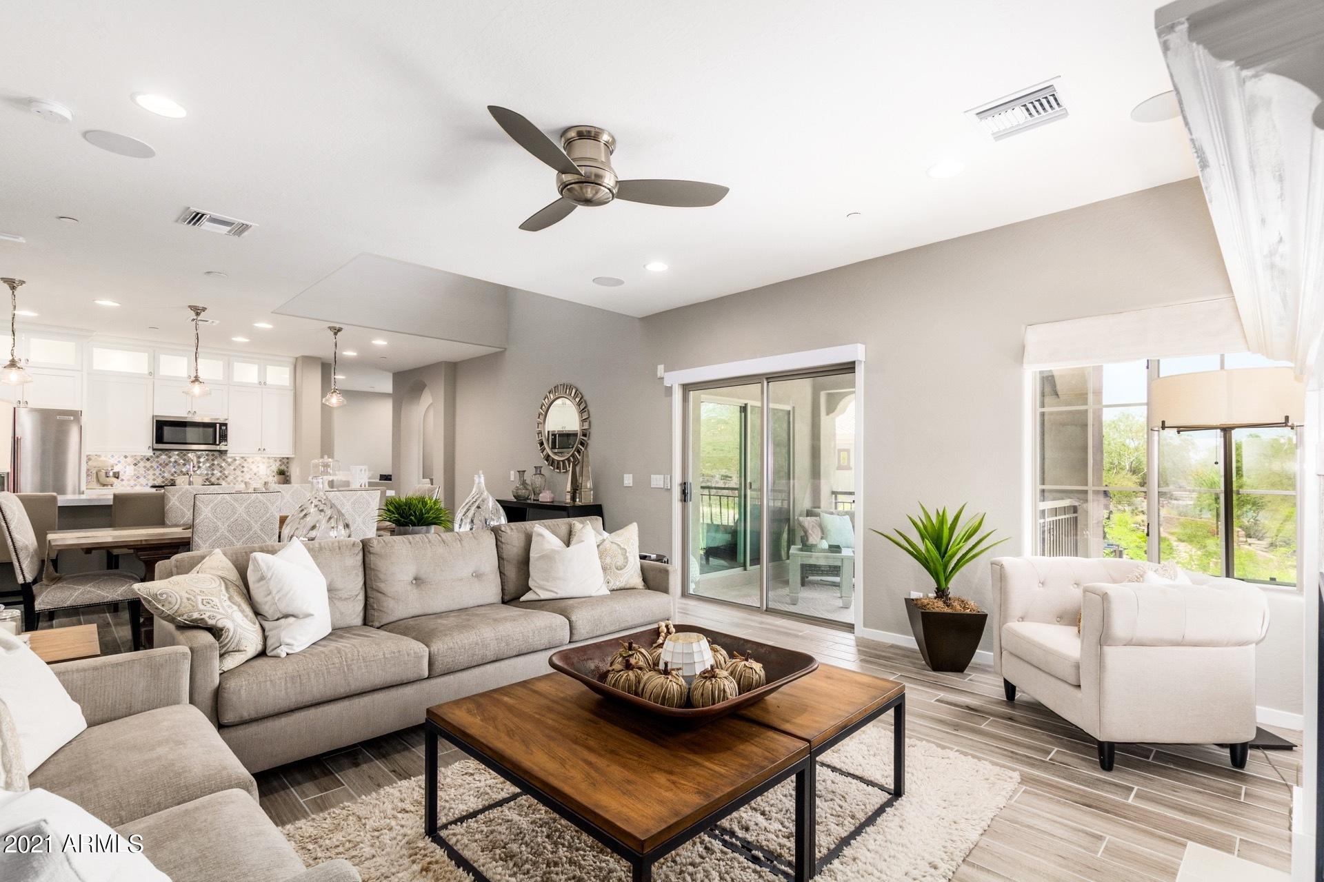 3935 East Rough Rider Road, Unit 1375 Phoenix, AZ 85050 - Photo 17 of 52 Custom Lighting and Fans Throughout