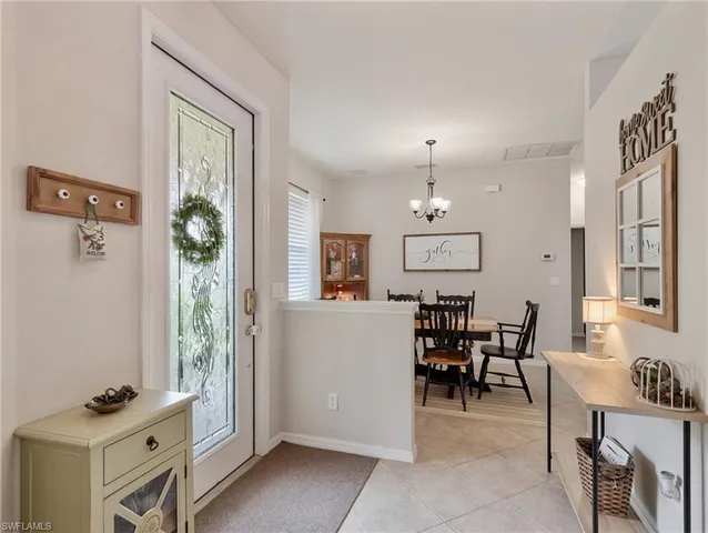 a view of a livingroom with furniture and window
