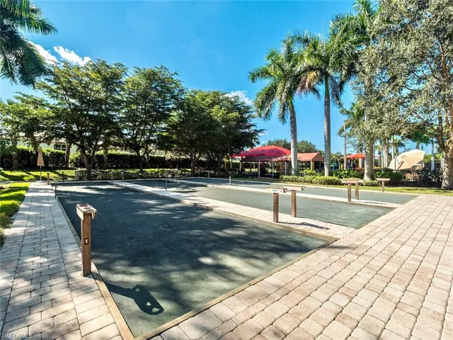 a view of a yard with swimming pool