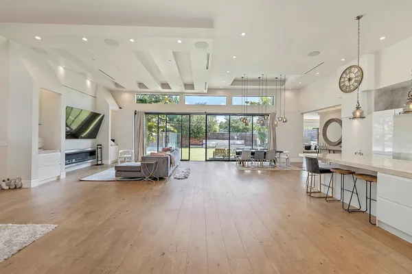 a view of a kitchen and dining area in the room