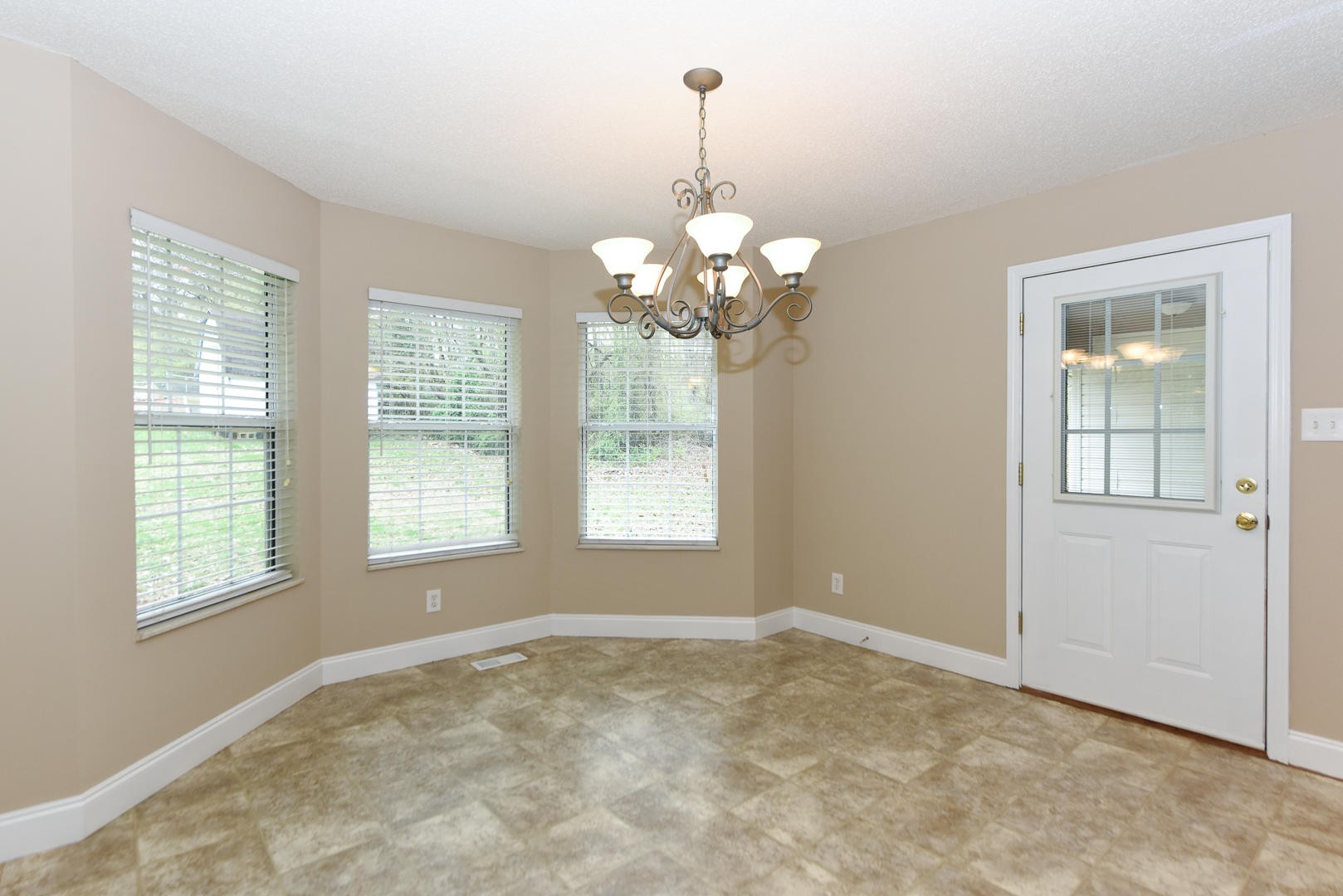 3605 Big Springs Ridge Road Friendsville, TN 37737 - Photo 15 of 32 a view of a windows and chandelier in a room