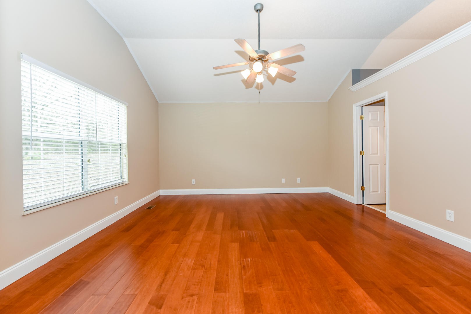 3605 Big Springs Ridge Road Friendsville, TN 37737 - Photo 16 of 32 wooden floor in an empty room with a window