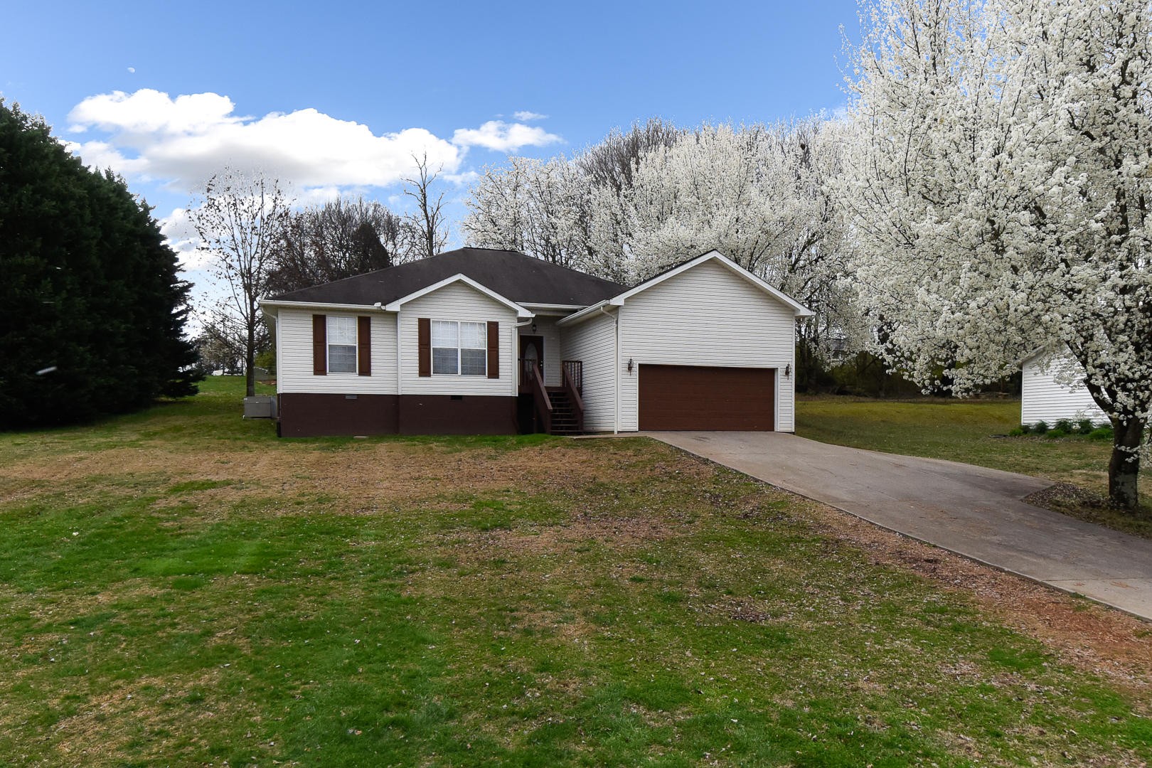 3605 Big Springs Ridge Road Friendsville, TN 37737 - Photo 2 of 32 a view of a house with a yard and large tree