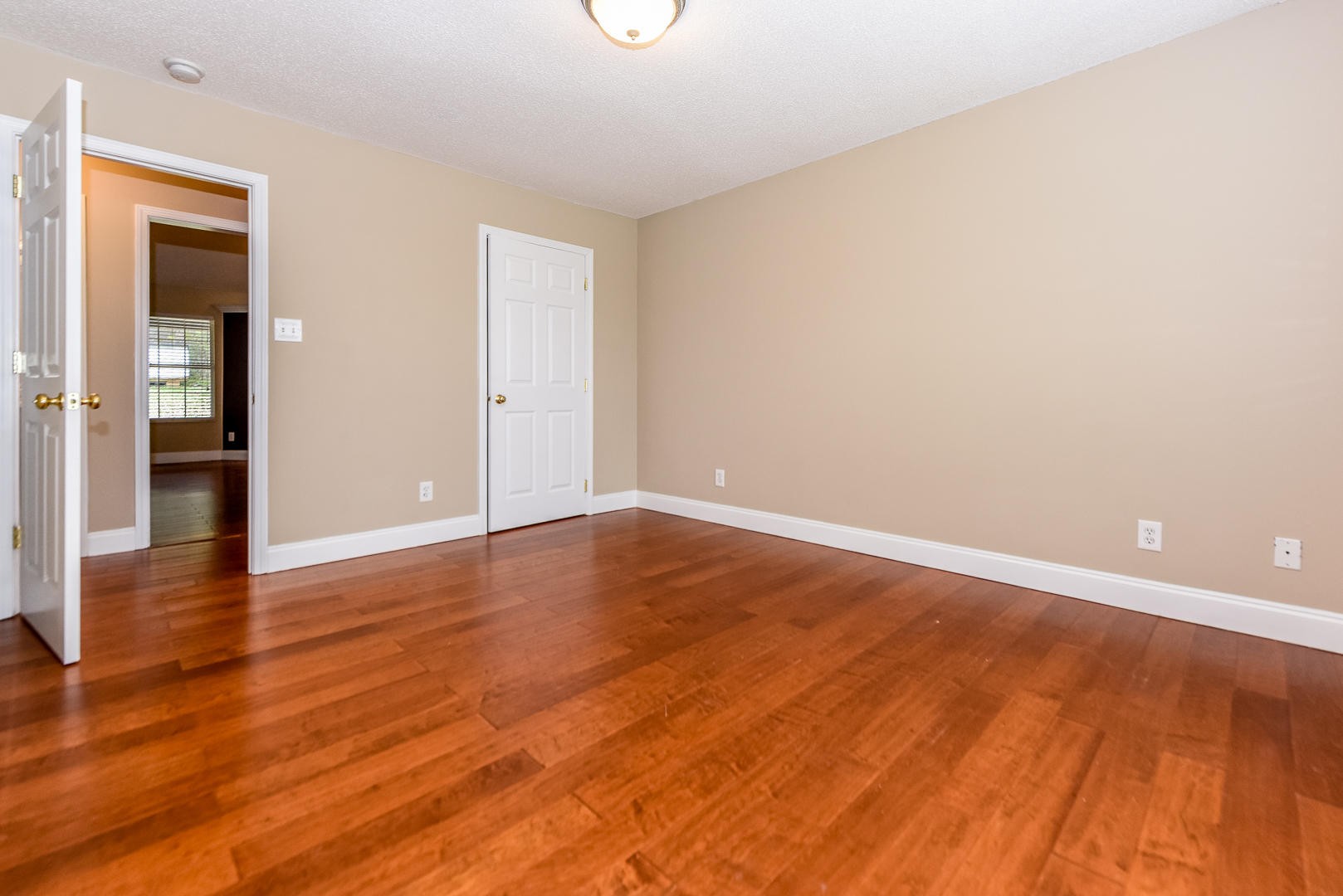 3605 Big Springs Ridge Road Friendsville, TN 37737 - Photo 23 of 32 a view of an empty room with wooden floor and closet