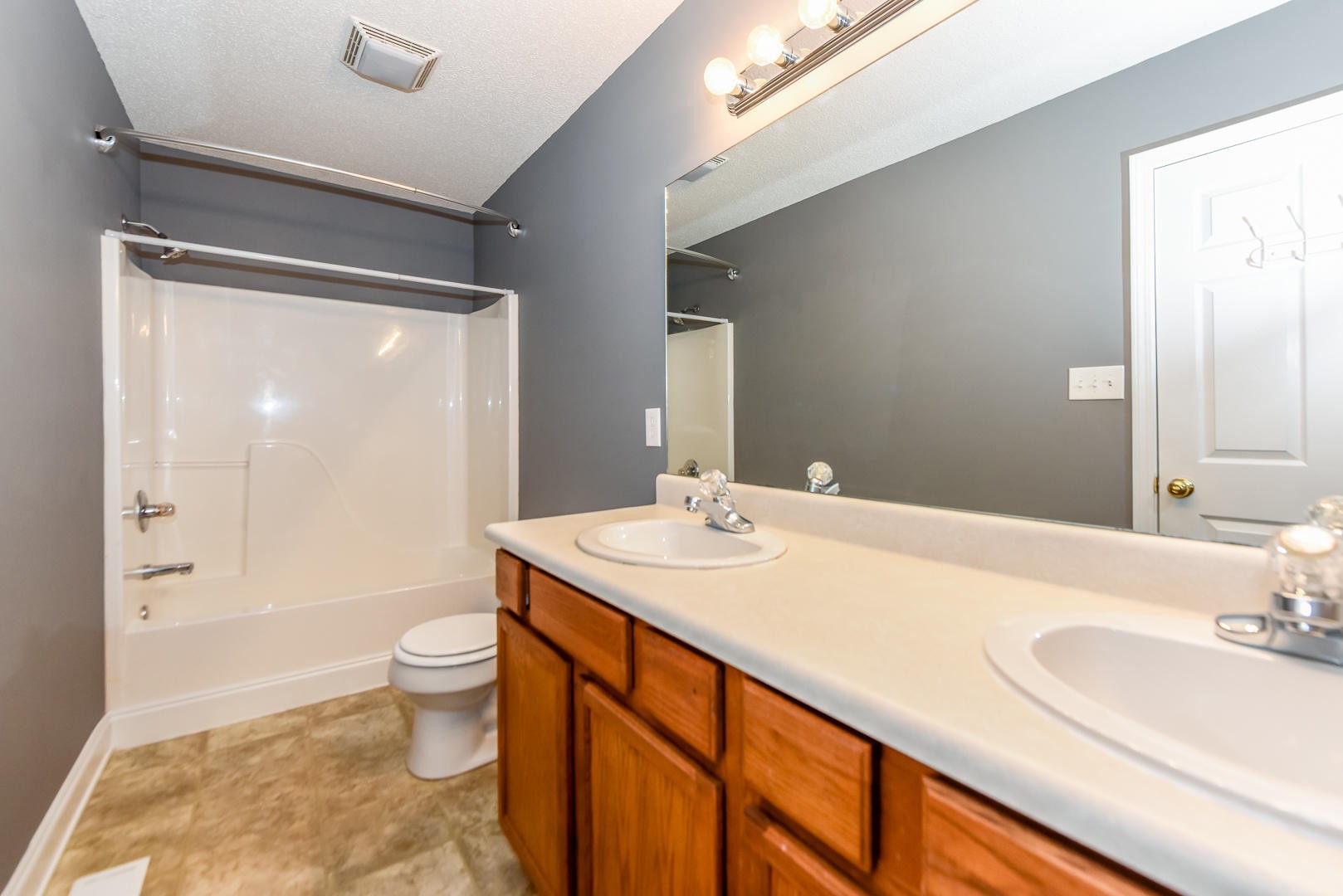 3605 Big Springs Ridge Road Friendsville, TN 37737 - Photo 24 of 32 a bathroom with a sink toilet a shower and a mirror