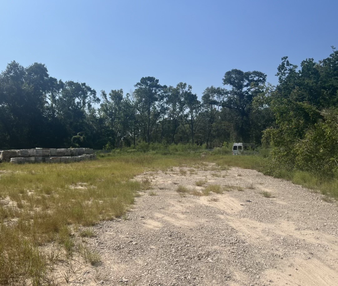 9612 Humble Westfield Road Houston, TX 77032 - Photo 8 of 9 a view of a swimming pool with an outdoor space and seating area