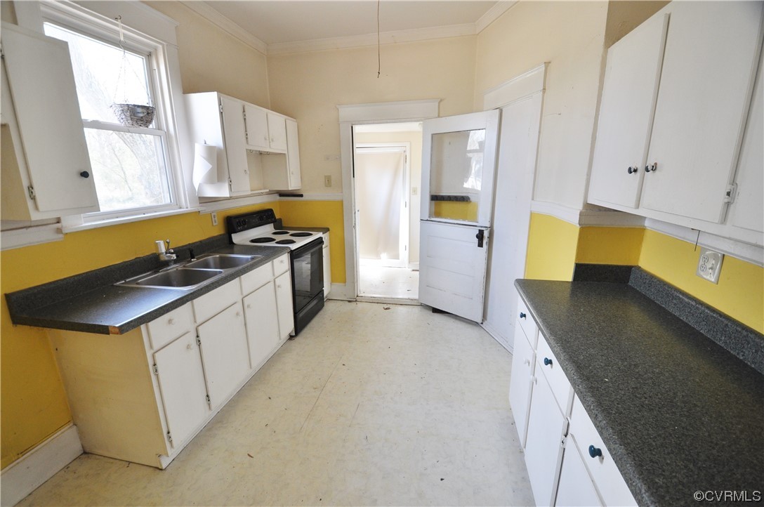 5301 Penick Road Richmond, VA 23228 - Photo 6 of 11 a kitchen with stainless steel appliances granite countertop a sink and a stove