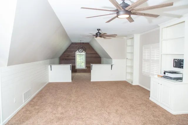 a view of entryway and kitchen