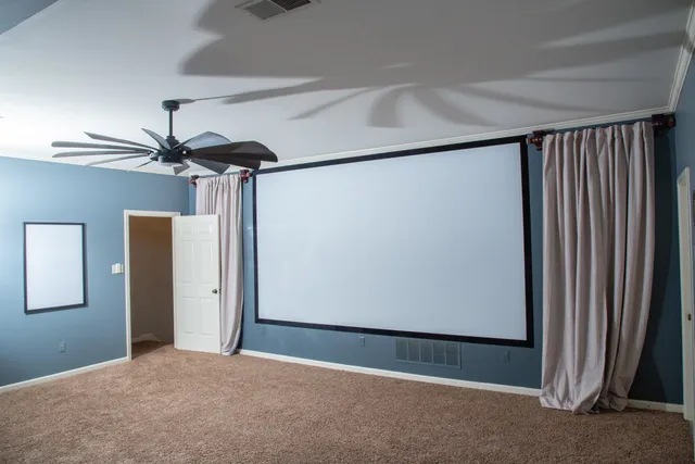 a view of a room with wooden walls