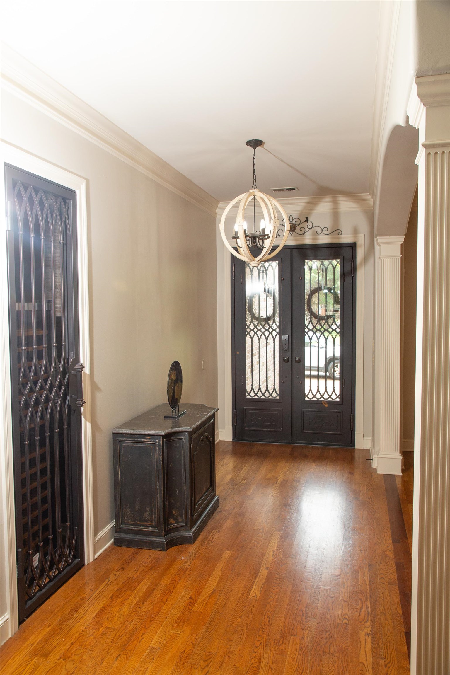 10060 Avent Ridge Cove Collierville, TN 38017 - Photo 7 of 40 an empty room with wooden floor and windows