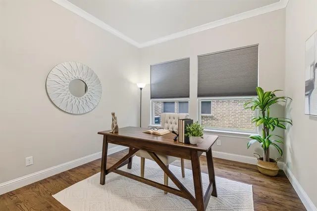 a workspace with furniture and window