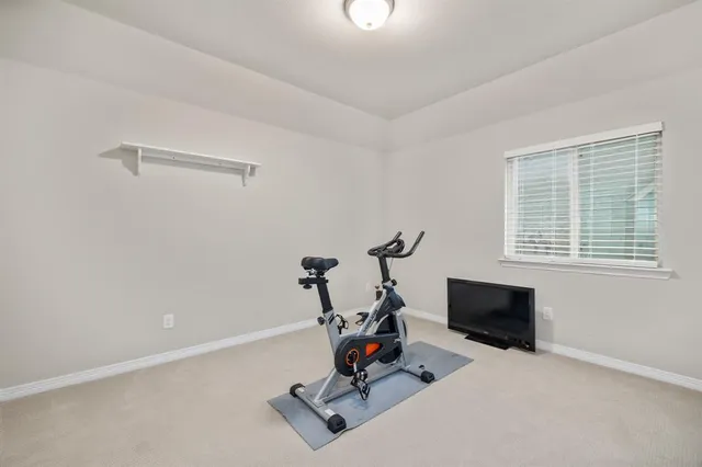 a view of workspace with gym equipment