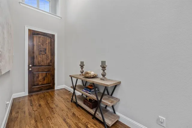 a view of a workspace with furniture