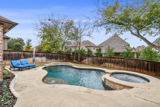 a view of a backyard with a tub