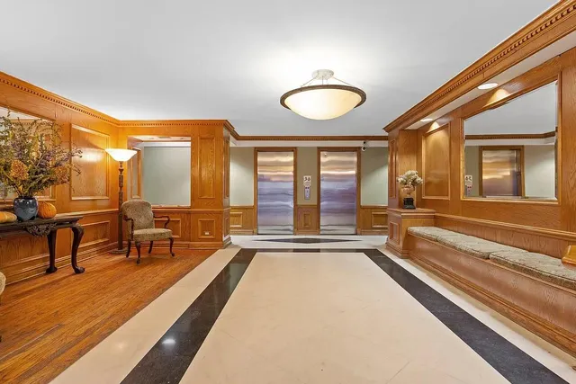 a spacious bathroom with a large tub and shower