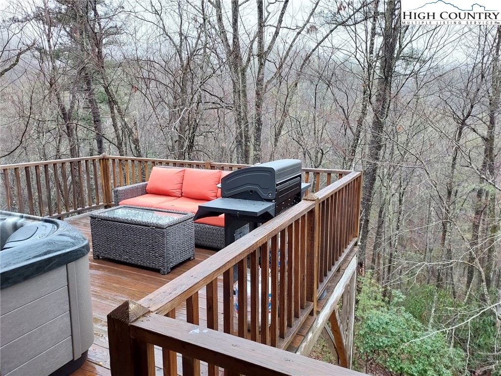 247 Hawkbill Road Ferguson, NC 28624 - Photo 12 of 25 a view of outdoor space with seating and trees