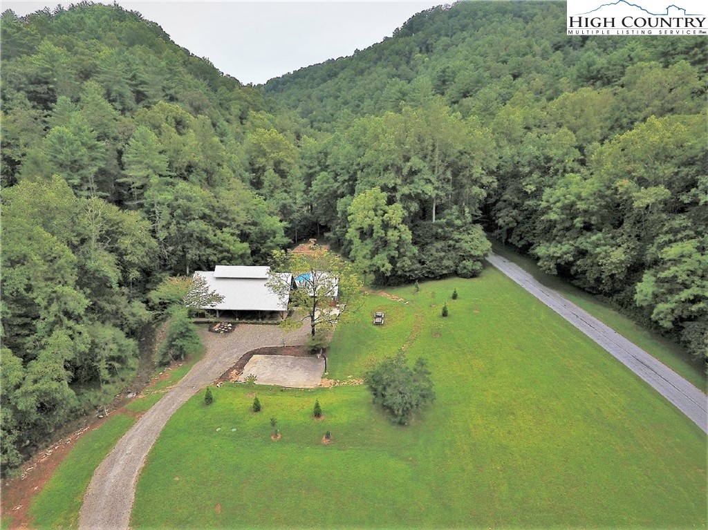 247 Hawkbill Road Ferguson, NC 28624 - Photo 18 of 25 an aerial view of a house with a yard