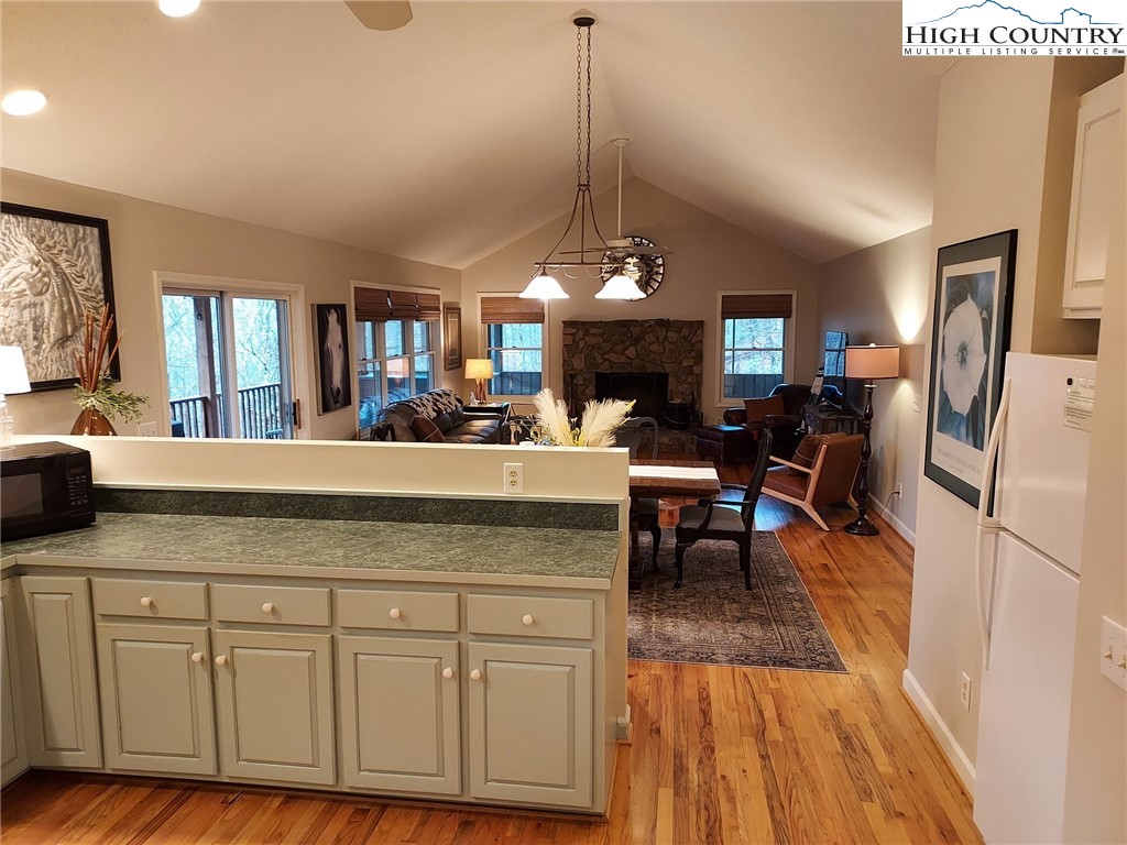 247 Hawkbill Road Ferguson, NC 28624 - Photo 3 of 25 a view of a kitchen counter space dining table and a couch