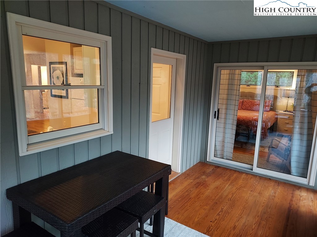 247 Hawkbill Road Ferguson, NC 28624 - Photo 8 of 25 a living room with a table and windows