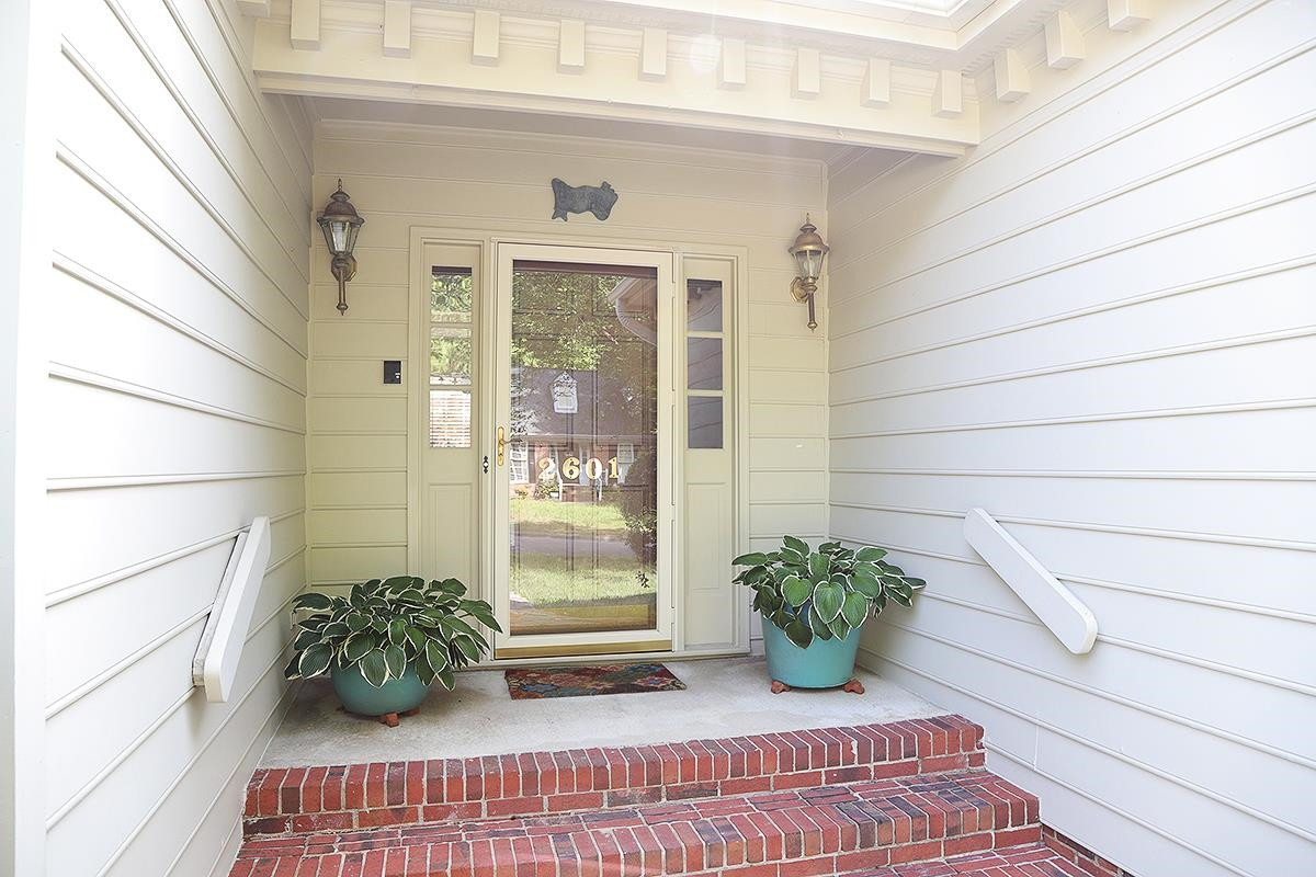2601 Ridgewell Court Raleigh, NC 27613 - Photo 3 of 28 a view of porch with a bench