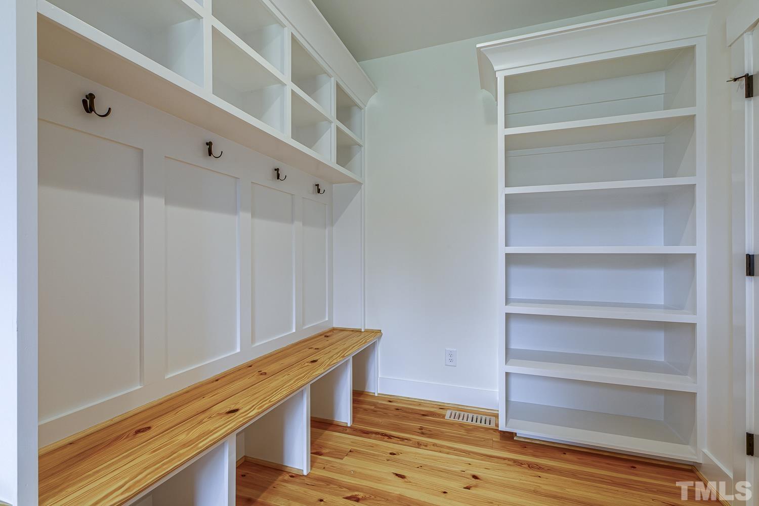 742 River Road Fuquay-Varina, NC 27526 - Photo 29 of 68 a view of an empty room with wooden floor