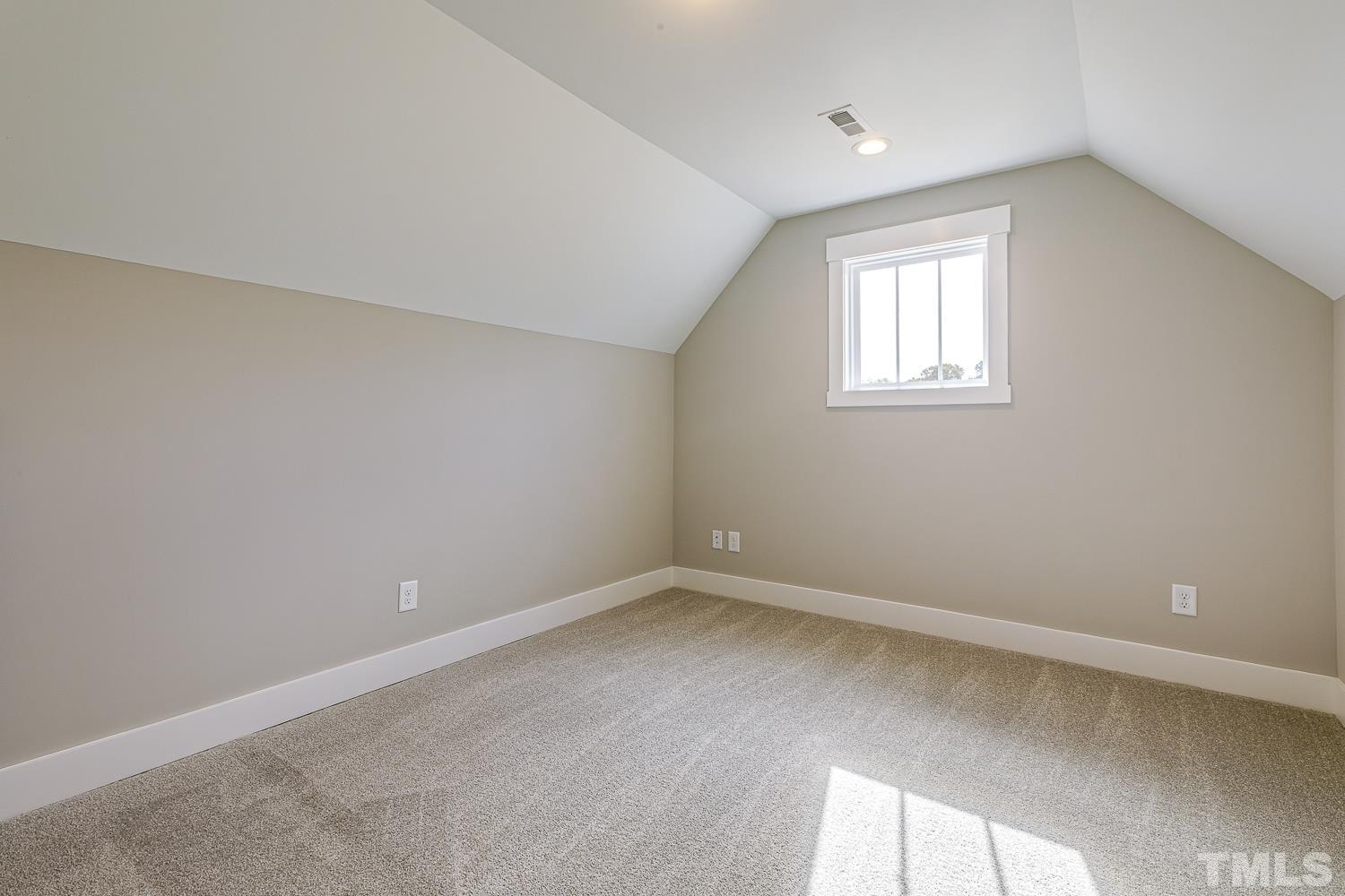 742 River Road Fuquay-Varina, NC 27526 - Photo 60 of 68 an empty room with a window