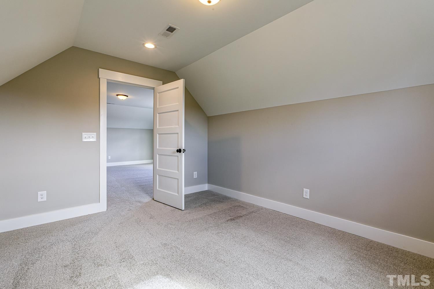 742 River Road Fuquay-Varina, NC 27526 - Photo 61 of 68 an empty room with a bathroom